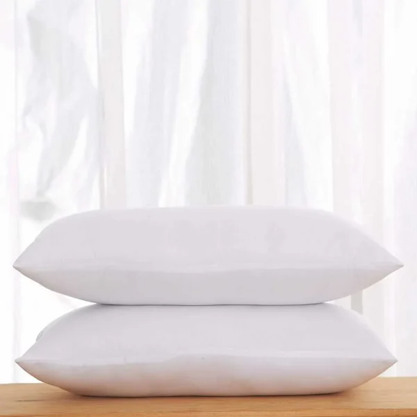High-quality white pillow fillings with smooth cotton covers, ideal for side and back sleepers.