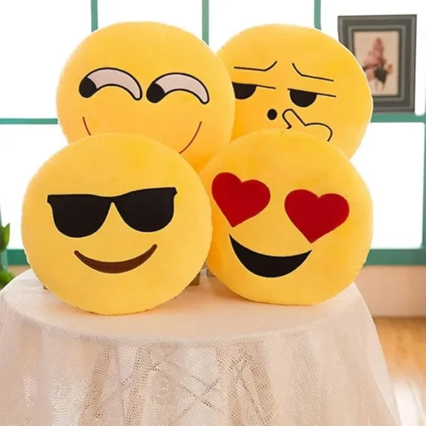 Emoji cushions by ZateeN featuring assorted smiley face designs