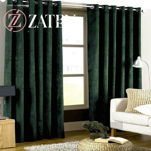 Two panels of premium forest green velvet curtains with silver eyelets, showing a rich, deep-toned fabric and plush texture.